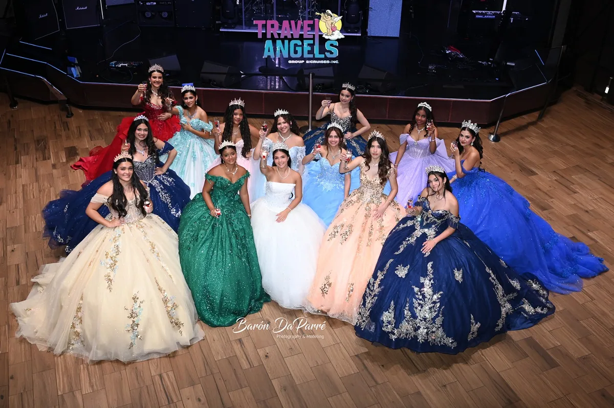 Quinceañeras in colorful gala dresses celebrating together aboard the cruise